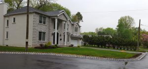 a Belgium block curbing and landscapig job in Alpine NJ