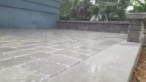a patio retaining wall and walkway job in Edgewater NJ completed