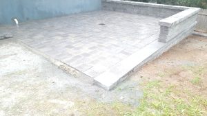 a patio retaining wall and walkway job in progress in Edgewater NJ 2