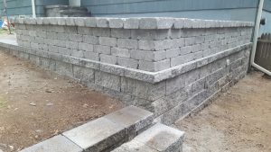 a patio retaining wall and walkway job in progress in Edgewater NJ