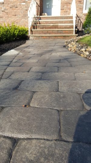 a walk way with a natural stome retaining wall in Tenafly NJ 4